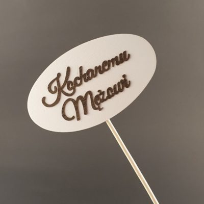 Tabliczka na piku z napisem: Kochanemu Mężowi