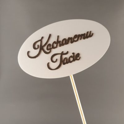 Tabliczka na piku z napisem: Kochanemu Tacie