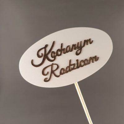 Tabliczka na piku z napisem: Kochanym Rodzicom