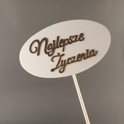 Tabliczka na piku z napisem: Najlepsze Życzenia