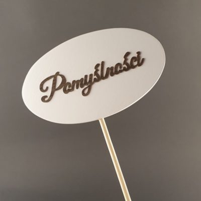 Tabliczka na piku z napisem: Pomyślności