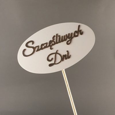 Tabliczka na piku z napisem: Szczęśliwych dni