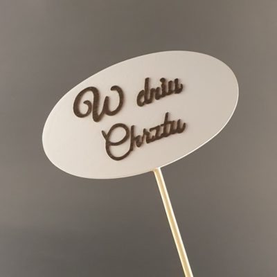 Tabliczka na piku z napisem: W dniu Chrztu