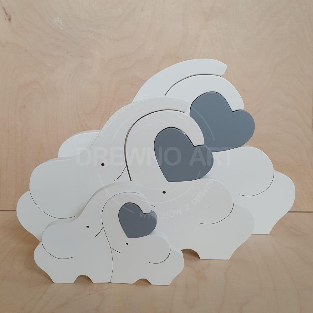 Białe słonie z szarym sercem - trzy wymiary Białe słonie z szarym sercem - trzy wymiary