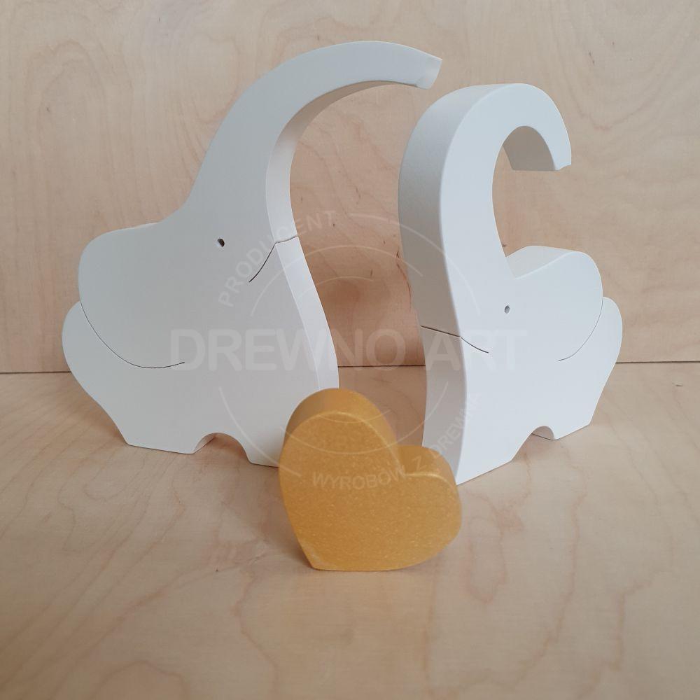 Białe słonie z drewna ze złotym sercem Białe słonie z drewna ze złotym sercem
